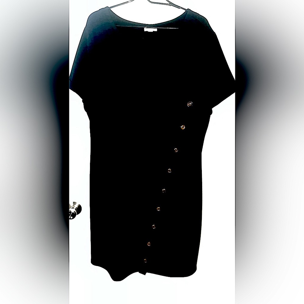 A Cato black dress with buttons down the front.